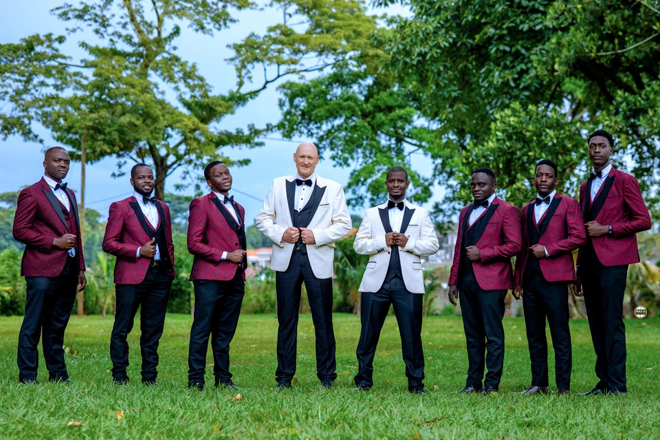 Groom posing with his wedding party